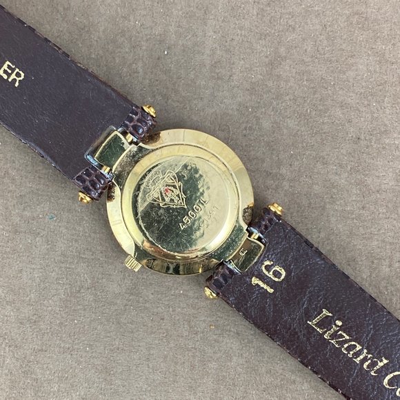 Vintage Gucci 4500L watch with Black Enamel face Gold sword hands Brown Strap - Picture 7 of 10